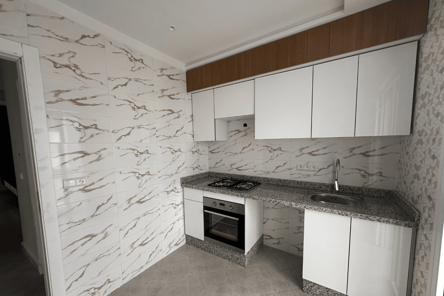 شقق للبيع مرتيل بالسكن الاقتصادي مع توفر المرآب – وسط المدينة 7