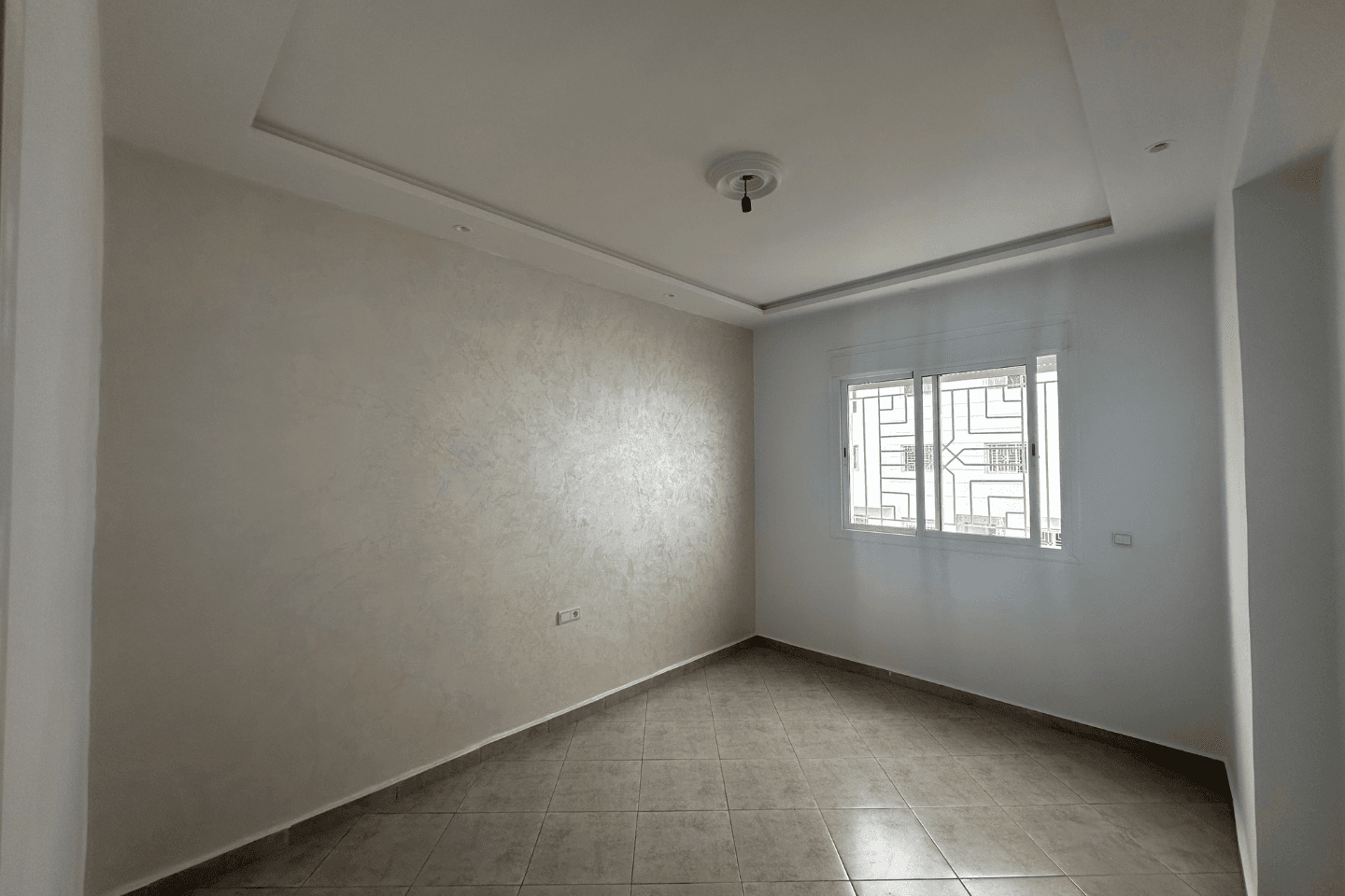 شقق للبيع مرتيل بالسكن الاقتصادي مع توفر المرآب – وسط المدينة 1